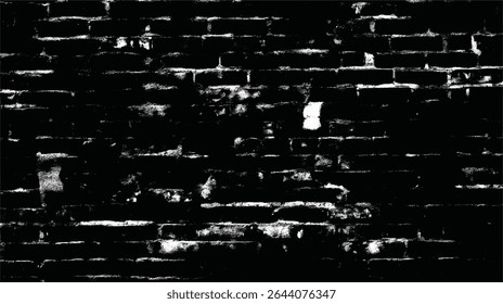 a monochrome image showing a brick wall with visible damage and deterioration on the brick surface