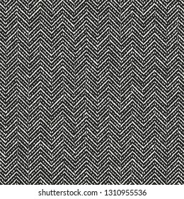 Monochrome Irregularly Dashed Textured Herringbone Motif. Seamless Pattern.