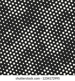 Monochrome Irregularly-Sized Polka Dots Graphic Motif. Seamless Pattern.