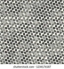 Monochrome Irregulary-Sized Dots Variegated Textured Distressed Background. Seamless Pattern.