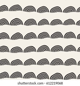 Monochrome minimalistic seamless pattern with arcs. Simple hand drawn texture. Vector background with rounded inky lines 