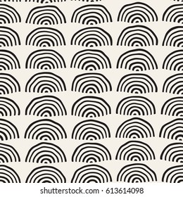 Monochrome minimalistic seamless pattern with arcs. Simple hand drawn texture. Vector background with rounded inky lines 