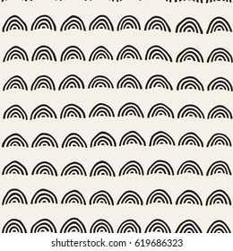 Monochrome minimalistic seamless pattern with arcs. Simple hand drawn texture. Vector background with rounded inky lines 