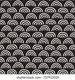 Monochrome minimalistic seamless pattern with arcs. Simple hand drawn texture. Vector background with rounded inky lines 