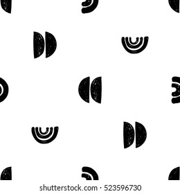 Monochrome minimalistic tribal seamless pattern with crescent, arcs, curves. Inspired by signs of aboriginal culture. Vector background with isolated inky black art on white backdrop for nursery.