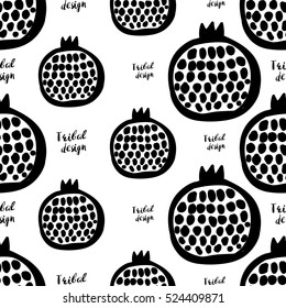 Monochrome minimalistic tribal seamless pattern with pomegranates. Inspired by signs of primitive aboriginal culture. Vector background with isolated inky black art on white backdrop for nursery.