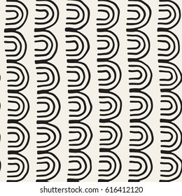 Monochrome minimalistic tribal seamless pattern with arc lines. Vector background with inky black art on white rounded stripe.