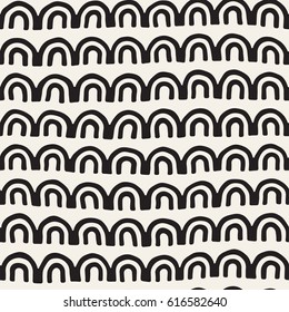Monochrome minimalistic tribal seamless pattern with arc lines. Vector background with inky black art on white rounded stripe.