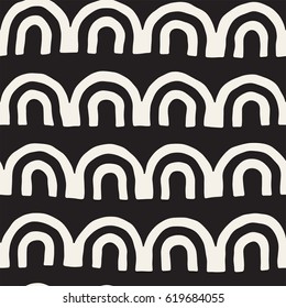 Monochrome minimalistic tribal seamless pattern with arc lines. Vector background with inky black art on white rounded stripe.