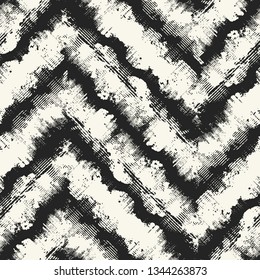 Monochrome Paint-Splattered Effect Chevron Graphic Motif. Seamless Pattern.