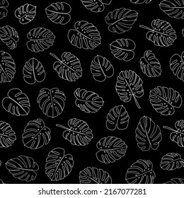Monochrome palm leaf seamless repeat pattern. Random placed, vector botany all over surface print.