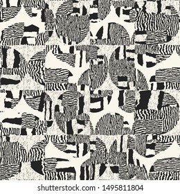 Monochrome Patched Textured Ethnic Graphic Motif. Seamless Pattern.