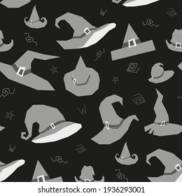 Monochrome pattern in black and white colors with witch's hats with ribbons and buckles in flat style. 