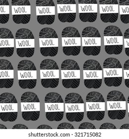 Monochrome pattern with skeins of wool yarn.