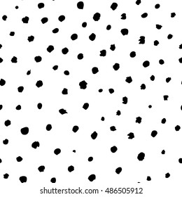 Monochrome polka dot vector seamless pattern. Background with black paint, ink brush strokes. Creative hand drawn texture. Grunge vector ink texture 