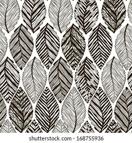 Monochrome seamless pattern of abstract leaves.