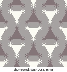 Monochrome seamless pattern with alternating geometric triangular shapes.