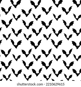 Monochrome seamless pattern with bats on a white background for decoration on Halloween