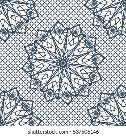 Monochrome seamless pattern. Black lacy drawing with decorative circles on a white background. Vector illustration