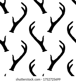 Monochrome seamless pattern with deer antlers. Vector nature wildlife animal background in black and white. Stag horns backdrop.