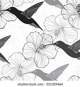 Monochrome seamless pattern with hibiscus flowers and hummingbirds.