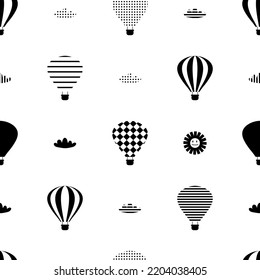 Monochrome seamless pattern with hot air balloons, clouds and sun. Perfect print for tee, textile, paper and fabric. Retro style vector illustration for surface design.

