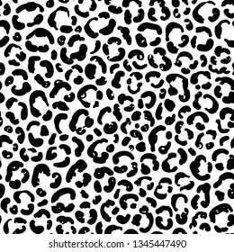 Monochrome seamless pattern of leopard, cheetah skin ornament.