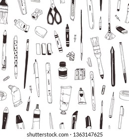 Monochrome seamless pattern with stationery, drawing items, creativity products or office supplies hand drawn with black contour lines on white background. Elegant realistic vector illustration.