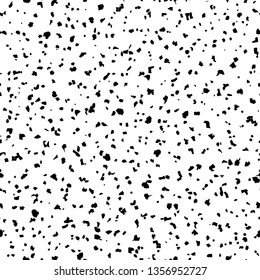 Monochrome seamless speckled, grainy texture of abstract black dots, spots.