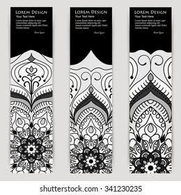 monochrome set of vertical banner templates with hand drawn tribal ornament over dark background, mandala. Vector illustration