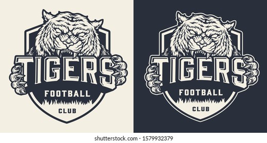 Monochrome soccer team badge with angry tiger holding inscription in vintage style isolated vector illustration