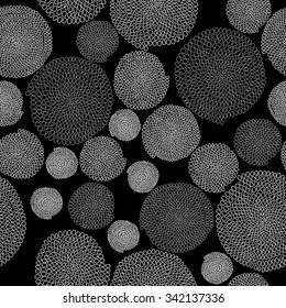 Monochrome texture with arcs and circles. Seamless. Black and white colors. Hand drawn beads. Round elements. Black background for decoration or printing on fabric. Outline backdrop for pattern fills.
