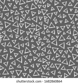 Monochrome triangle vector seamless pattern.