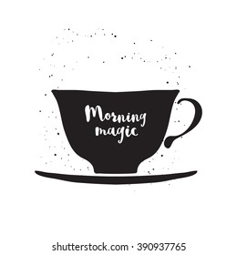 Monochrome Vector Teacup On White Background. Hand Drawn Cup With Lettering Morning Magic. Black And White Vector Illustration With Cup. Cup Vector Icon. Isolated Cup. Cup Of Coffee. 