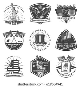 Monochrome vintage Independence Day labels set with american traditional and festive elements and symbols isolated vector illustration