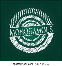 Monogamous written on a chalkboard. Vector Illustration. Detailed.