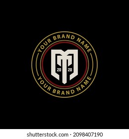 Monogramm, Badge-Logo, Anfangsbuchstaben M, T, MT oder TM, Moderne, Sporty, Weiß, Gold und rote Farbe auf schwarzem Hintergrund