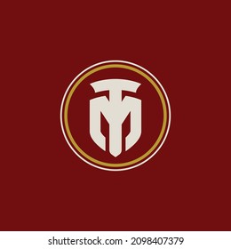 Monogram, Badge logo, Initial letters M, T, MT or TM, Modern, Sporty, white and gold color on red background