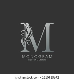 Monogram Classy M Letter logo icon vector design concept luxury nature leaf silver color.