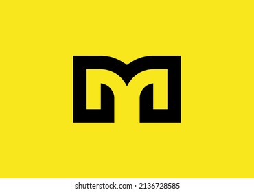 Monogram design based on open book cover letter, featuring letter "M"  neatly packed in negative space area.
