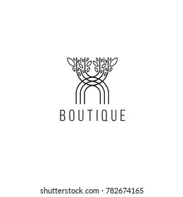 Monogram design element. Logo in form  of a tree, graceful template. Calligraphic elegant line art logo design. Letter emblem sign  for Royalty,  Boutique, Hotel, Heraldic, Jewelry, fashion store. 