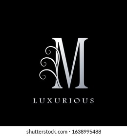 Monogram Initial Letter M Luxurious  Logo, vector design concept for luxury business indentity.