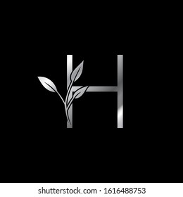 Monogram Initial Logo Letter H. Silver vector design concept floral leaves for business identity.