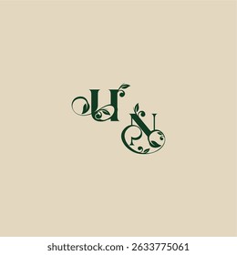 with monogram and leaf concept of elegant beautifull NU wedding organic logo letter