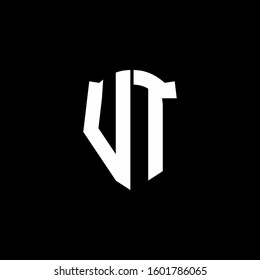 monogram letter logo ribbon with shield style isolated on black background