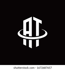AT monogram logo in a hexagon style and surrounded by a ring