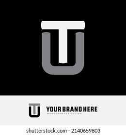 Monogram Logo, Initial letters T, U, TU or UT, Modern, Sporty, White and Grey Color on Black Background