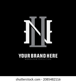 Monogram logo, Initial letters U, N, UN or NU, white and grey color on black background