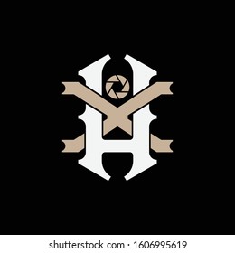 monogram logo letter HX or XH vintage, sport, and old school on black background