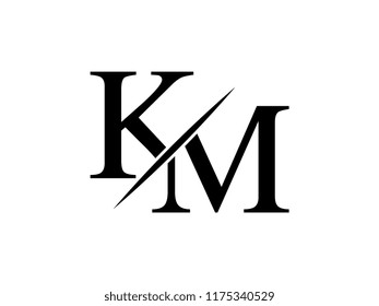 The monogram logo letter KM is sliced